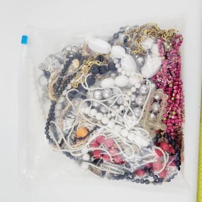 BAG OF PARTS, PIECES & BEADS OF JEWERLY
