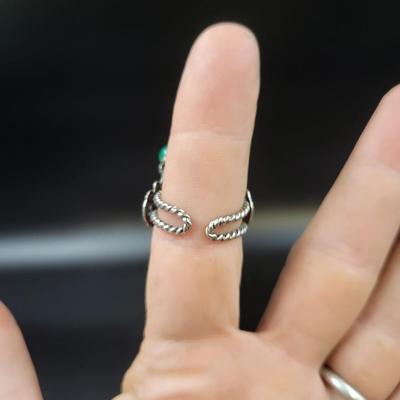 BEAUTIFUL SILVERTONED INTRICATE ADJUSTABLE RING