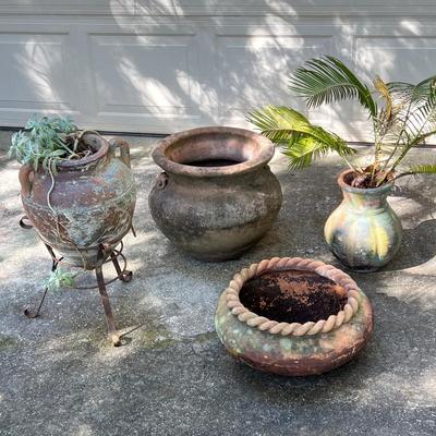 Four (4) Pieces Of Assorted Terracotta Planters