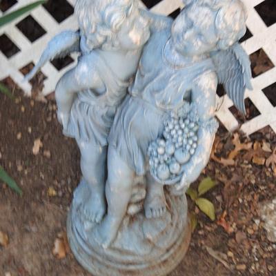 Outdoor yard art cherubs