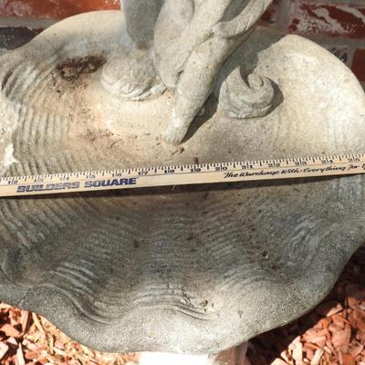 Concrete cherub bird bath