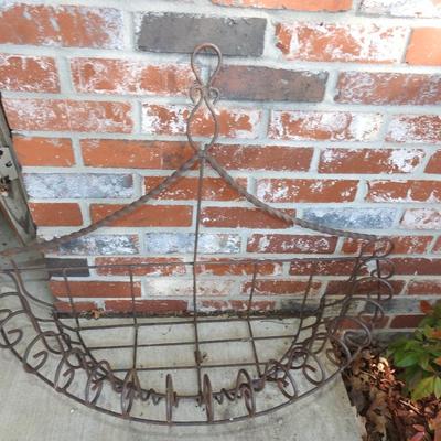 Large metal hanging plant basket