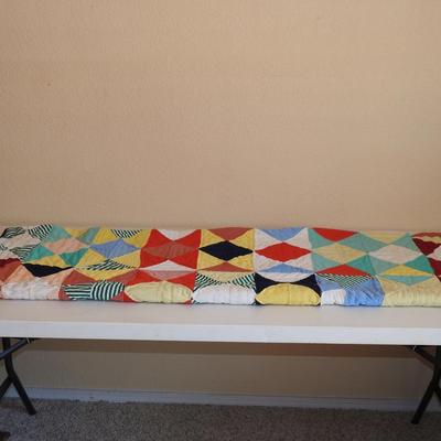 Half square, triangle quilt
