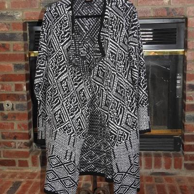 Womanâ€™s  sweater coat has pockets