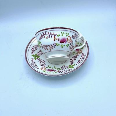 Striking Pink Lusterware Cup, Saucers, and Creamer