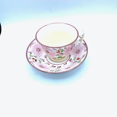 Striking Pink Lusterware Cup, Saucers, and Creamer