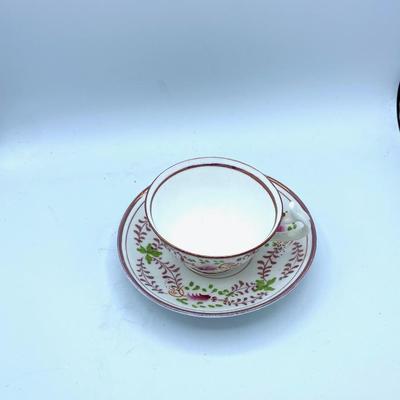 Striking Pink Lusterware Cup, Saucers, and Creamer