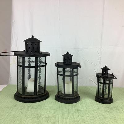 1425 Set of Three Black Metal Glass Lanterns