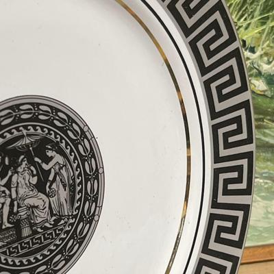 Vintage Plates and Marble Hold Books