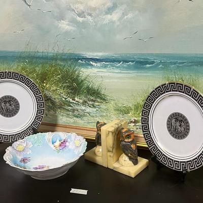 Vintage Plates and Marble Hold Books