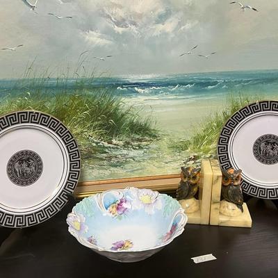 Vintage Plates and Marble Hold Books