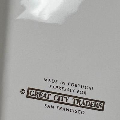 Vintage Plates and Marble Hold Books