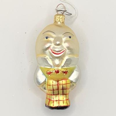 Lot 1440. Vintage Christopher Radko Glass Ornament, 1994 Egg Head