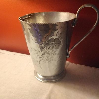 Hammered Aluminum pitcher with flower design