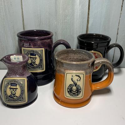 LOT 5R: Death Wish Coffee Mugs: Abe Lincoln Mug w/Fueled by Death Matching Creamer, Cauldron Aged Pumpkin Mug, & Red Skull Logo2017 Mug