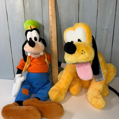 LOT 20R: Walt Disney Treasures Original Metal Tin Edition DVDs with Plush Pluto & Goofy