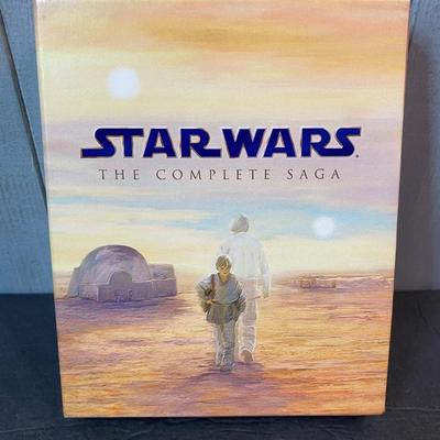 LOT C46: Star Wars DVD set & Baby Yoda Doll