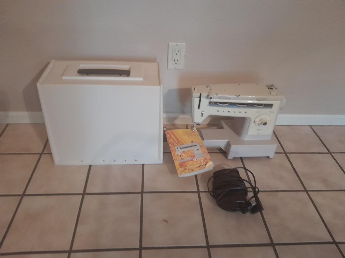 Clean singer stylist sewing machine 534 estatesales