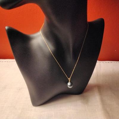 12mm Tahitian pearl on 18k bale with 14k necklace
