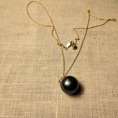 12mm Tahitian pearl on 18k bale with 14k necklace