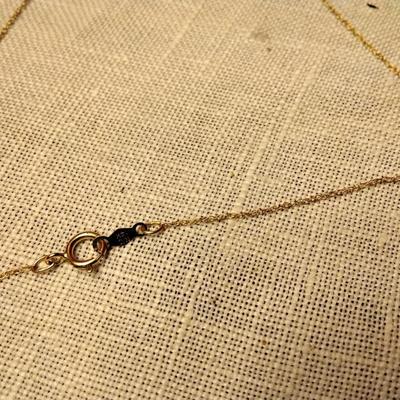 12mm Tahitian pearl on 18k bale with 14k necklace