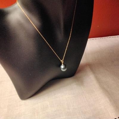 12mm Tahitian pearl on 18k bale with 14k necklace