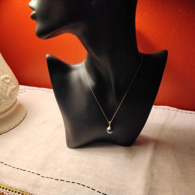 12mm Tahitian pearl on 18k bale with 14k necklace