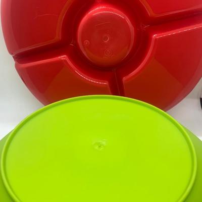 Plastic green salad bowl and attached claws and divided serving tray