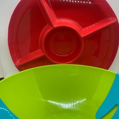 Plastic green salad bowl and attached claws and divided serving tray