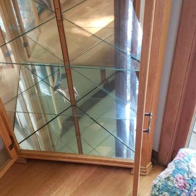 2 wood corner cabinets