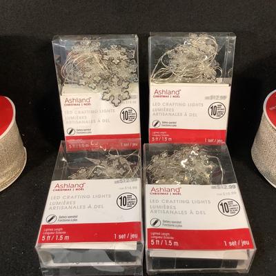 Lot 1527  Lot of Four Rolls Wired Gold/White Ribbon & Four PKG LED Snowflake Light String