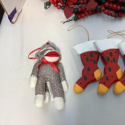 Lot 1562. Lot of Wooden Red/Green Heart & Beads Garland - Wooden Faux Stockings - Wooden Teddy Bear - Stuffed Monkey