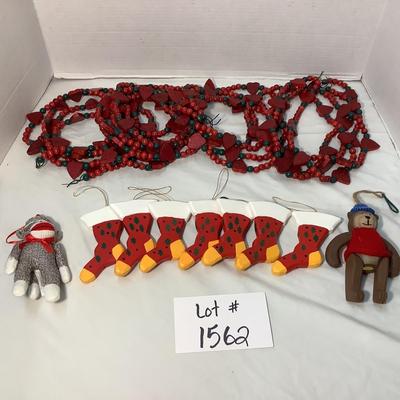 Lot 1562. Lot of Wooden Red/Green Heart & Beads Garland - Wooden Faux Stockings - Wooden Teddy Bear - Stuffed Monkey