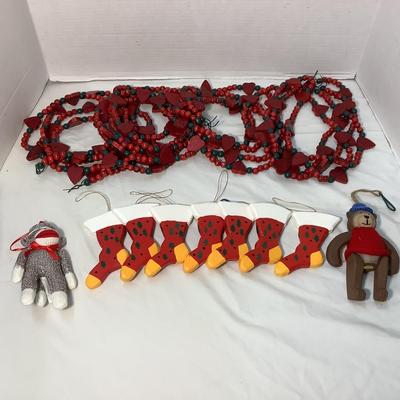 Lot 1562. Lot of Wooden Red/Green Heart & Beads Garland - Wooden Faux Stockings - Wooden Teddy Bear - Stuffed Monkey