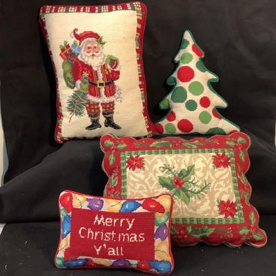 Lot 1572  Four Christmas Needlepoint Decorative Throw Pillows