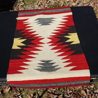 GROUPING OF FOUR WINNEBAGO BASKETS & NAVAJO WEAVING