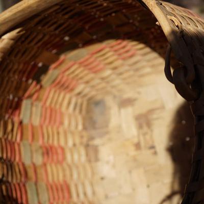 GROUPING OF WINNEBAGO BASKETS & NAVAJO WEAVING