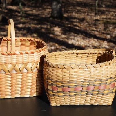 GROUPING OF TWO WINNEBAGO BASKETS AND NAVAJO WEAVING