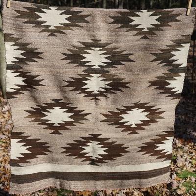 GROUPING OF TWO WINNEBAGO BASKETS AND NAVAJO WEAVING