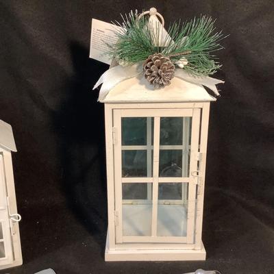 Lot 1578  Three White HolidayLanterns & White Candle Set with Remote
