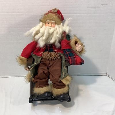 Lot 1581  Santa in the Rocking Chair