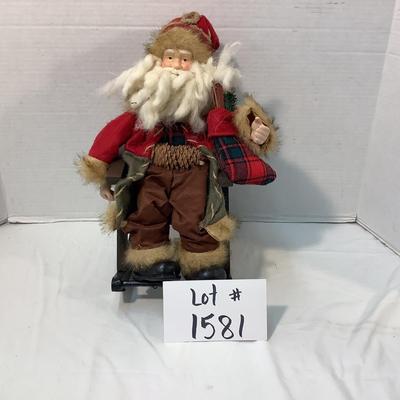 Lot 1581  Santa in the Rocking Chair