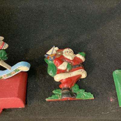 Lot 1592. Vintage Cast Iron Stocking Hooks