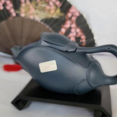 Fan and teapot