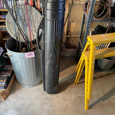 Trash Can full of Fishing Poles