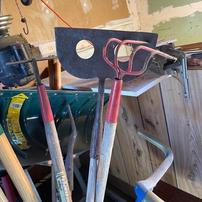Trash can of yard tools!