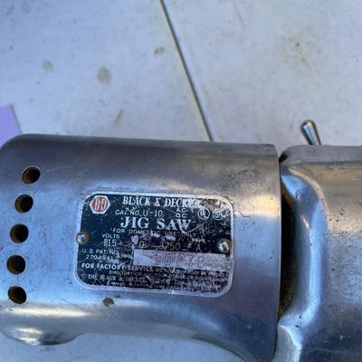 Vintage jig saw in wood box