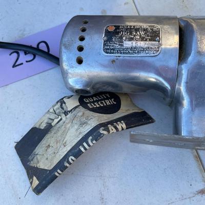 Vintage jig saw in wood box