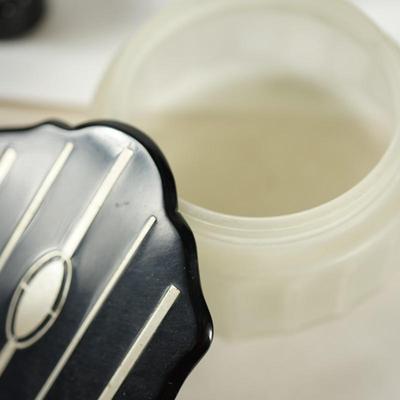 NINE PIECE ART DECO VANITY SET TO BLACK W/SILVER TRIM.