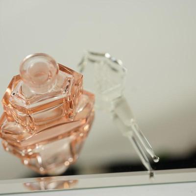 PAIR OF VINTAGE PERFUME BOTTLES TO INCLUDE CZECHOSLOVAKIAN /INTAGLIO CUT DABBER LADY W/ WHIPPET